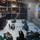 a pistol looking over an office level from goldeneye 007 recreated entirely in far cry 5